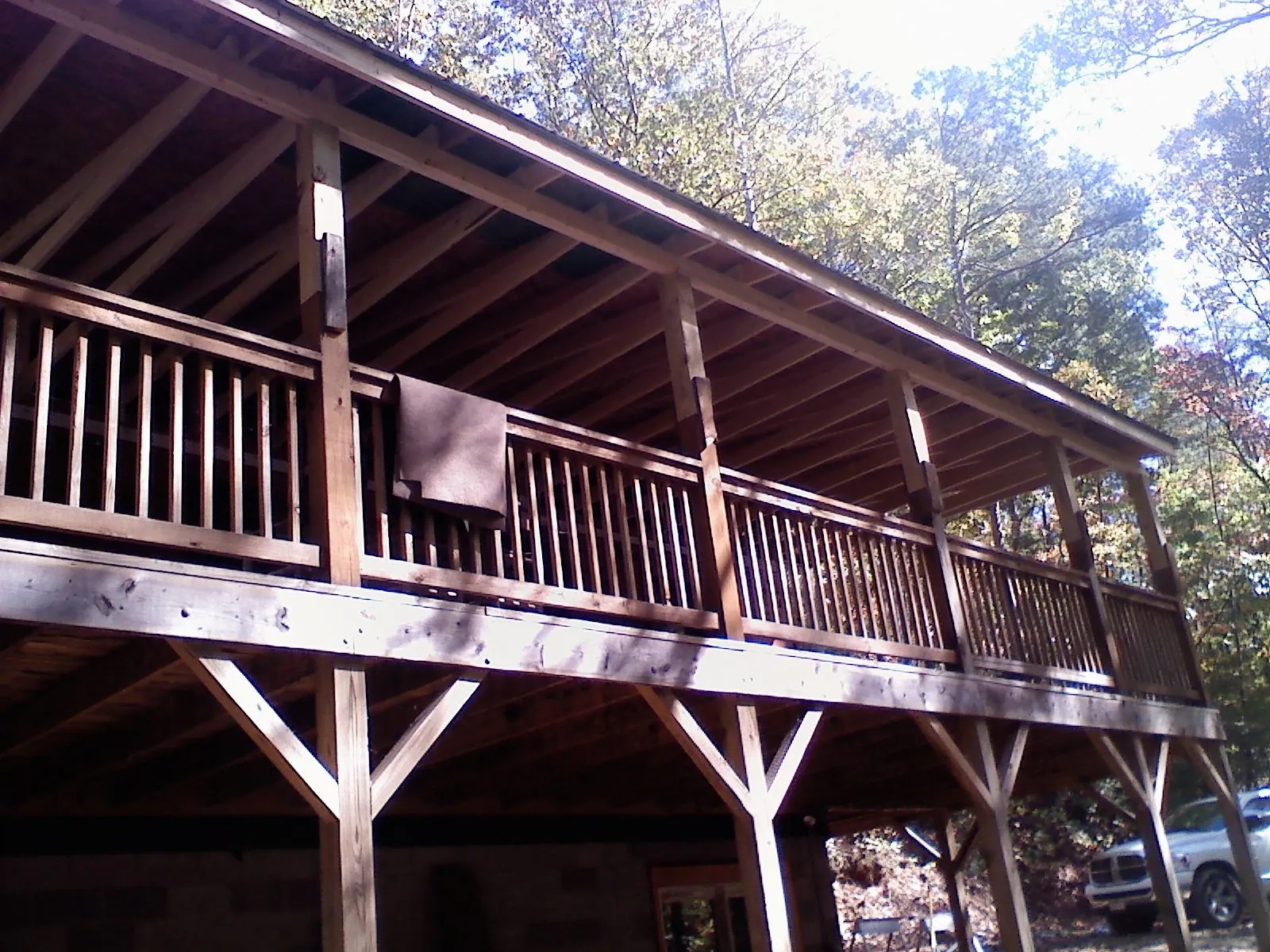 Timber framing under a new elevated porch and deck — Roof Leak Repair in Pingree by Roofing Brothers